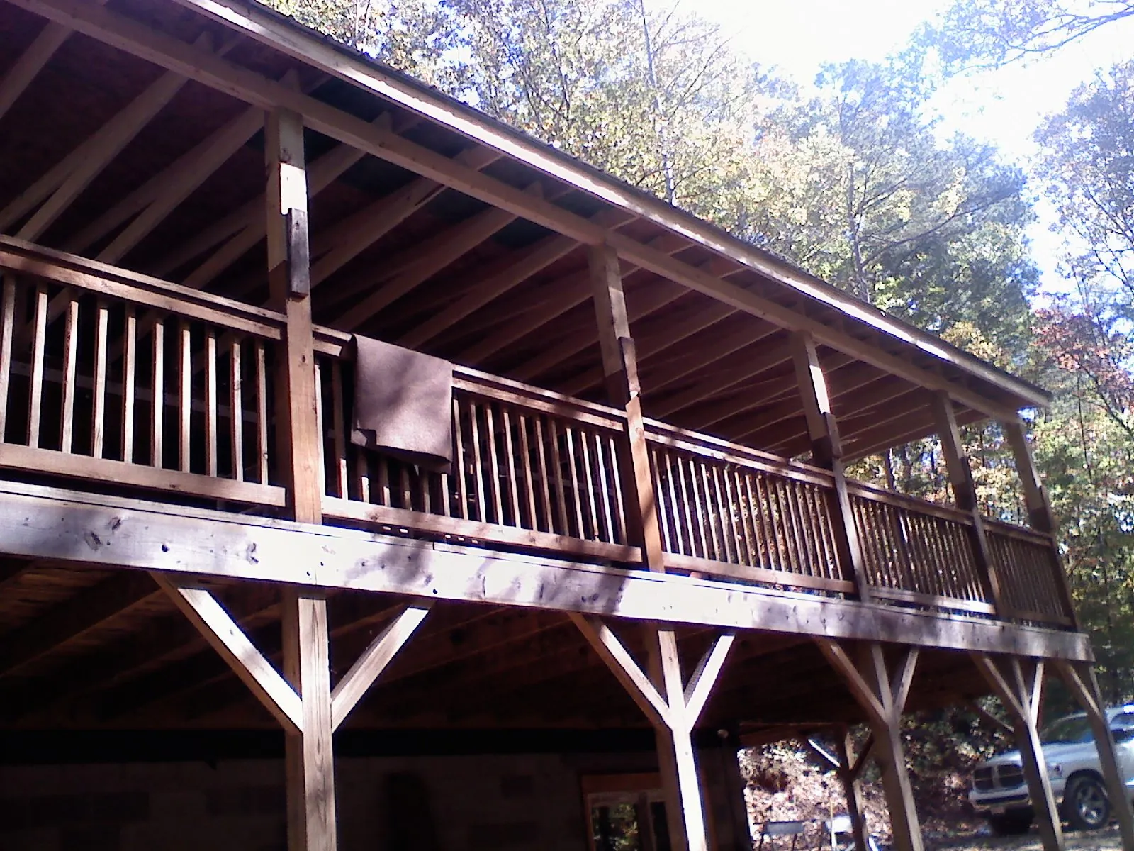 Timber framing under a new elevated porch and deck — Roof Leak Repair in Faucett by Roofing Brothers
